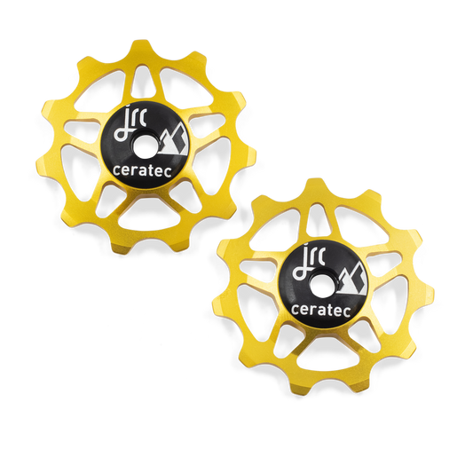 Gold, lightweight aluminium 11 tooth pulley wheel set for bicycle, compatible with Shimano 12 speed road derailleurs
