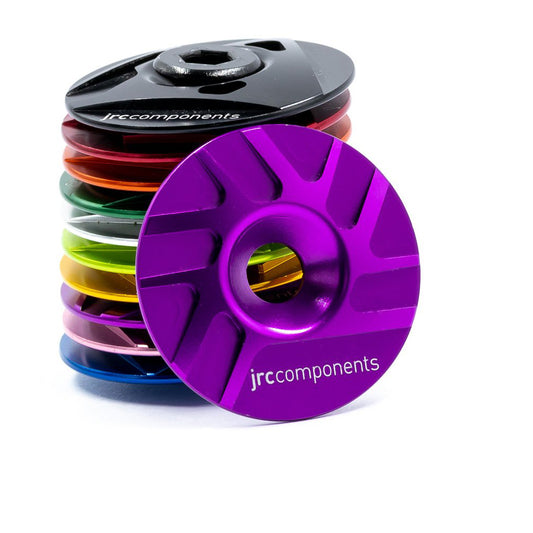 Purple, lightweight, aluminium Ahead stem top cap with sleek pathway design