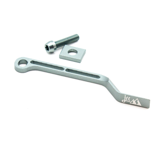 Gunmetal, lightweight aluminium bicycle chain catcher kit with alloy mounting bolts and braze-clamp spacer