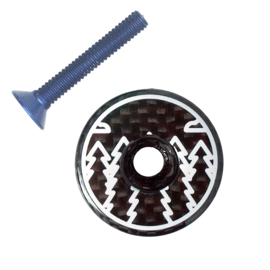 Carbon fibre Ahead bicycle stem top cap with black and white forest design, UD weave and gloss finish and blue bolt