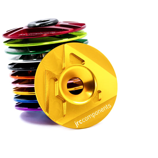 Gold, lightweight, aluminium Ahead bicycle stem top cap with mountain design